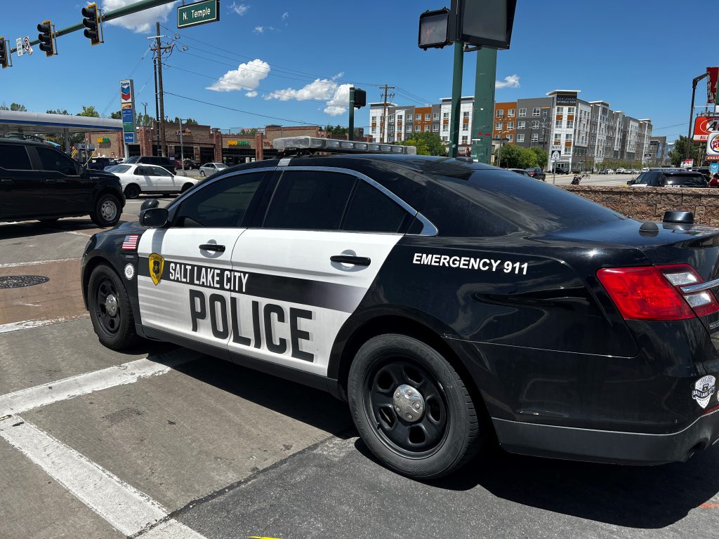 A police car at the scene of a crash