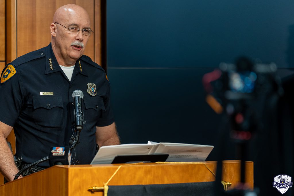 SLCPD Chief Mike Brown speaking during a press conference.