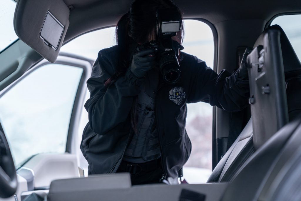 A SCLPD Crime Lab technician processing a scene.