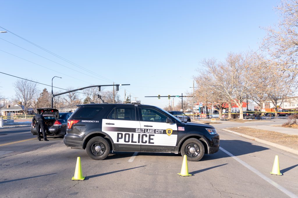 Photo of cop car blocking traffic.