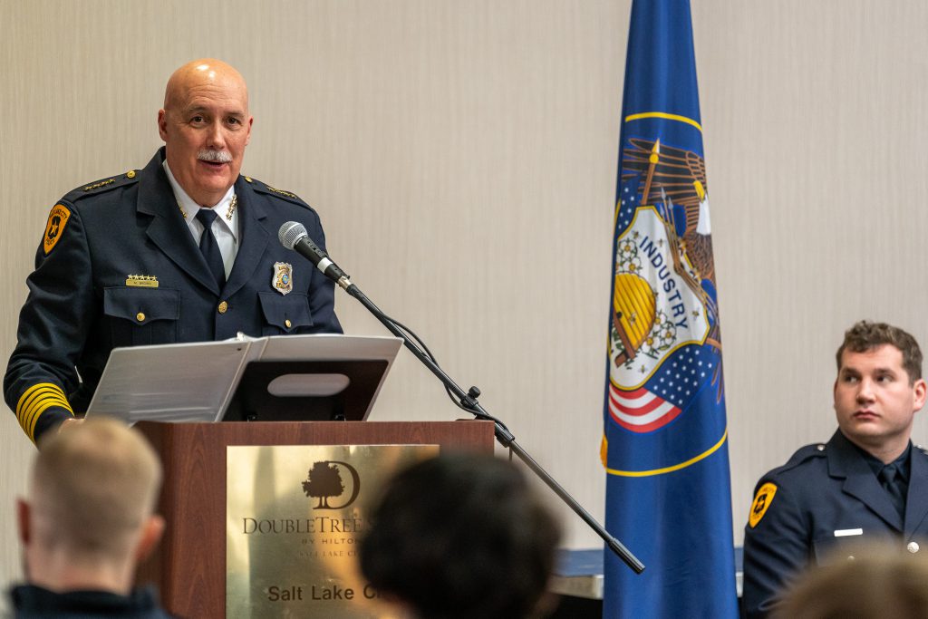 Salt Lake City Police Chief Mike Brown speaking during Class 160 police academy graduation.