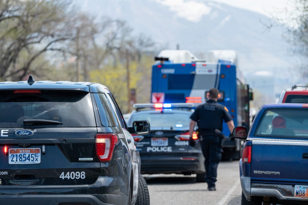 Police Cars with a bus in the background