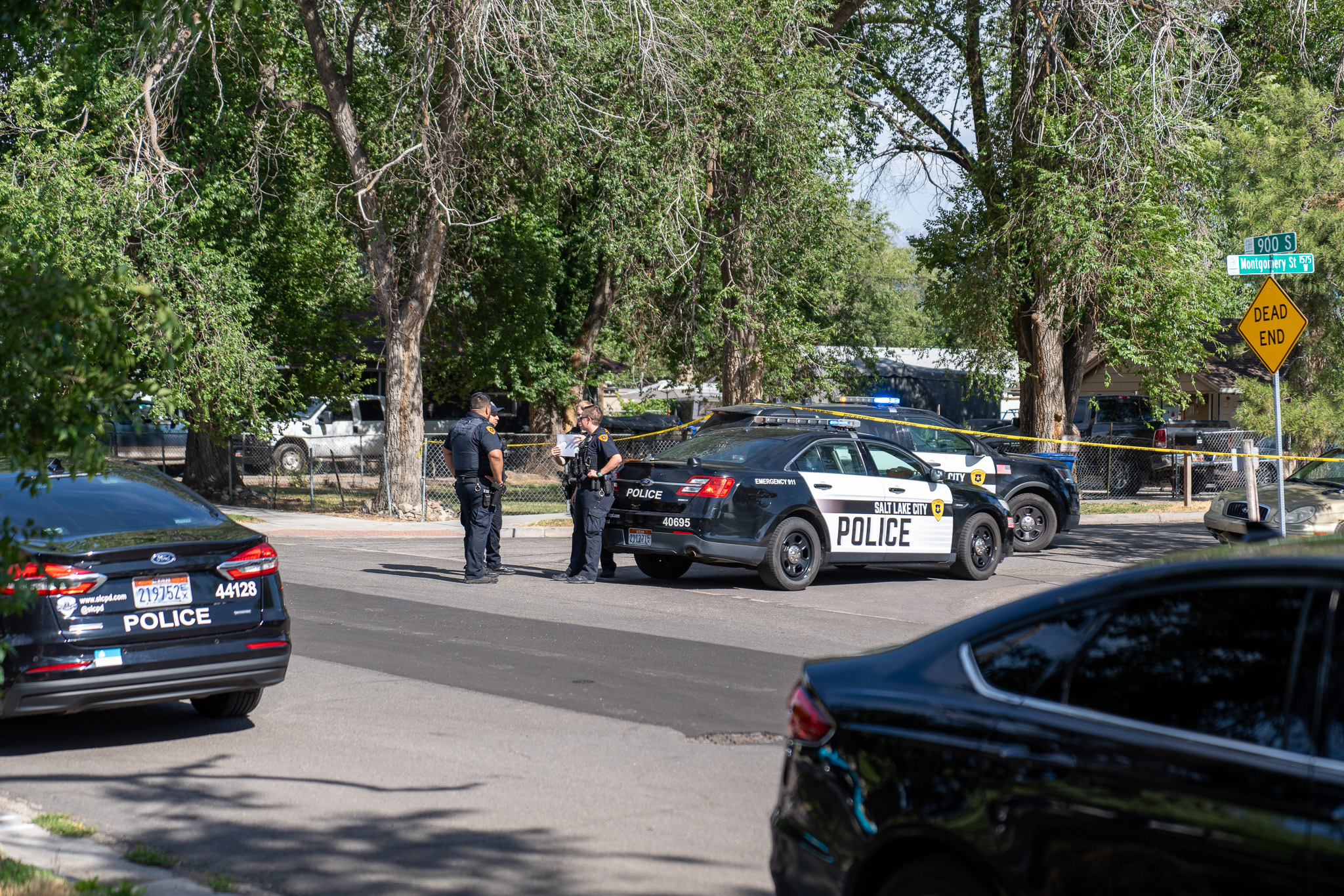 Officers investigate the scene of a shooting on June 22, 2023