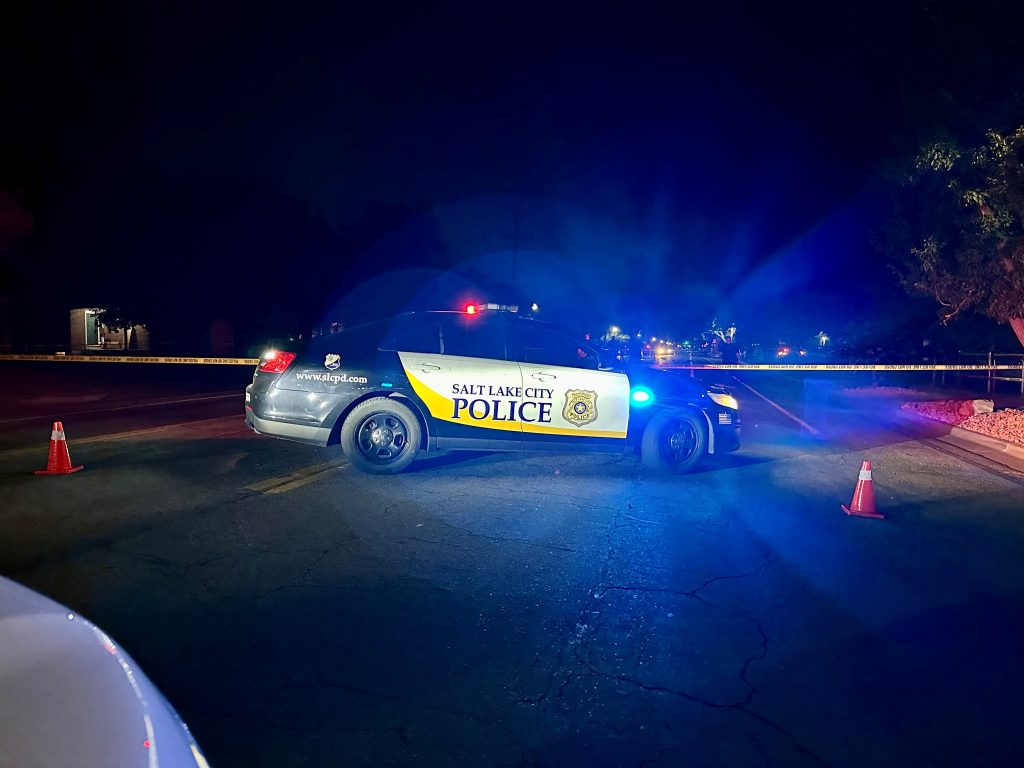 2-A SLCPD police car blocking an intersection at a deadly crash scene (SLCPD photo | July 3, 2023).